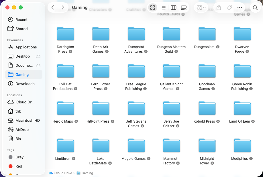 A macOS Finder window showing a range of folders named for TTRPG publishers